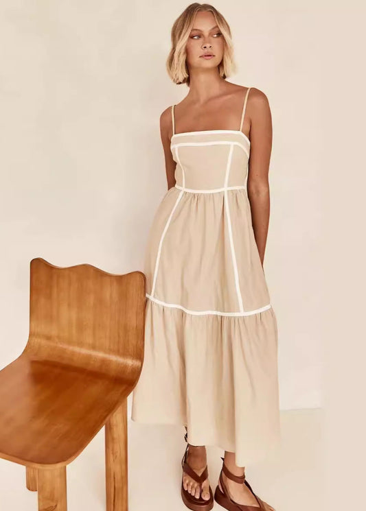 Robe mi-longue à bretelles fines et jupe volantée