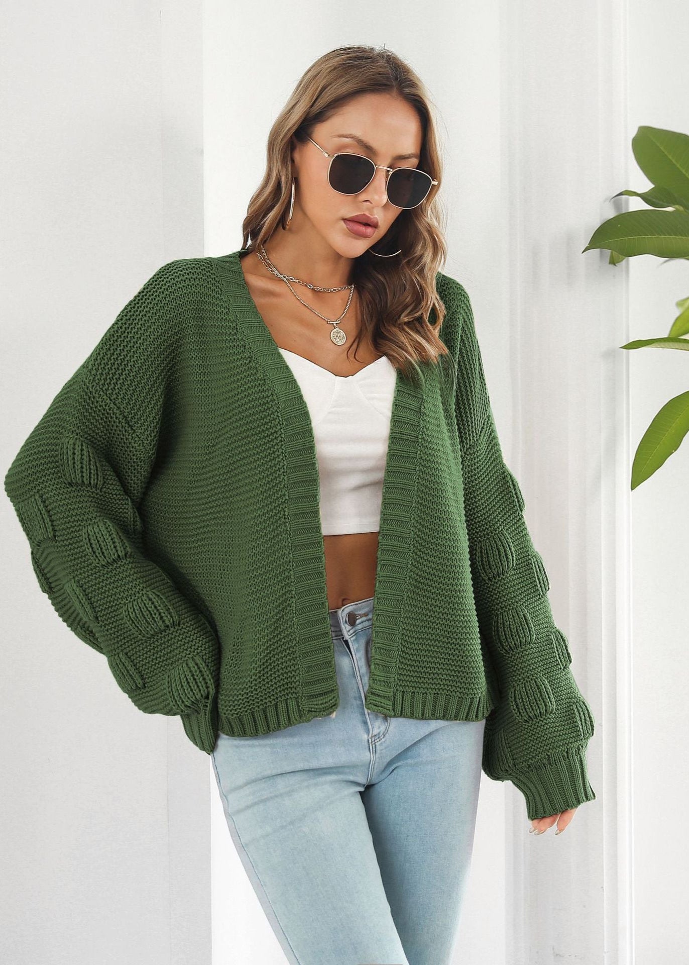 Cardigan en maille épaisse manches bouffantes