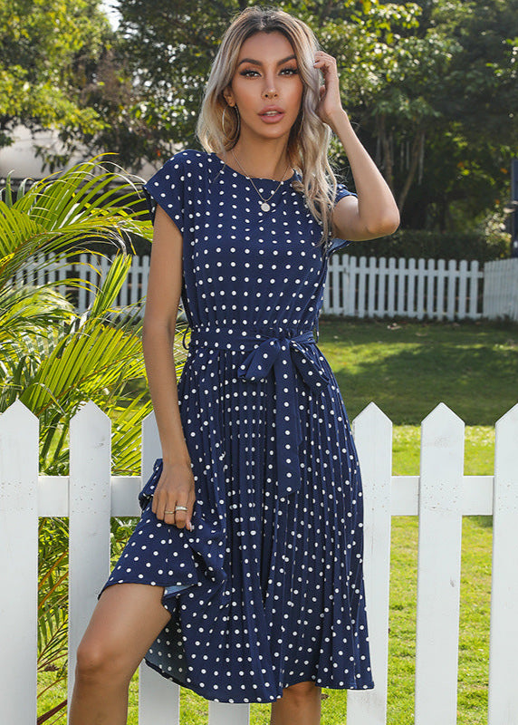 Robe midi à pois élégante ceinturée