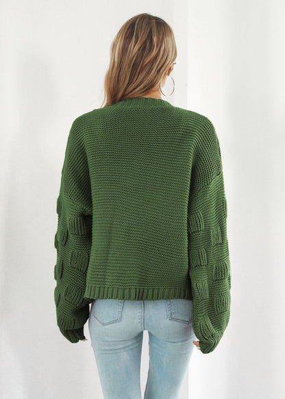 Cardigan en maille épaisse manches bouffantes