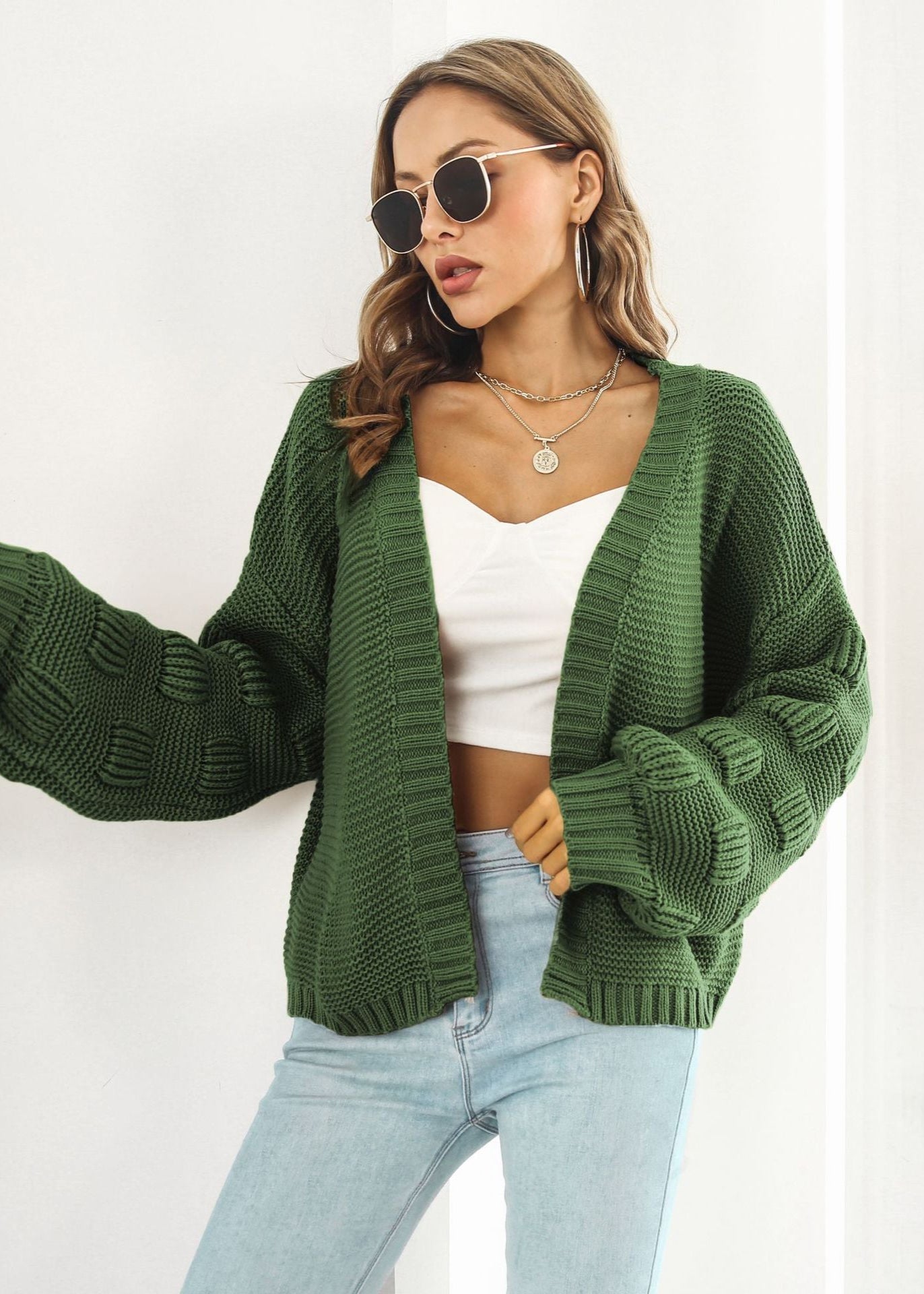 Cardigan en maille épaisse manches bouffantes