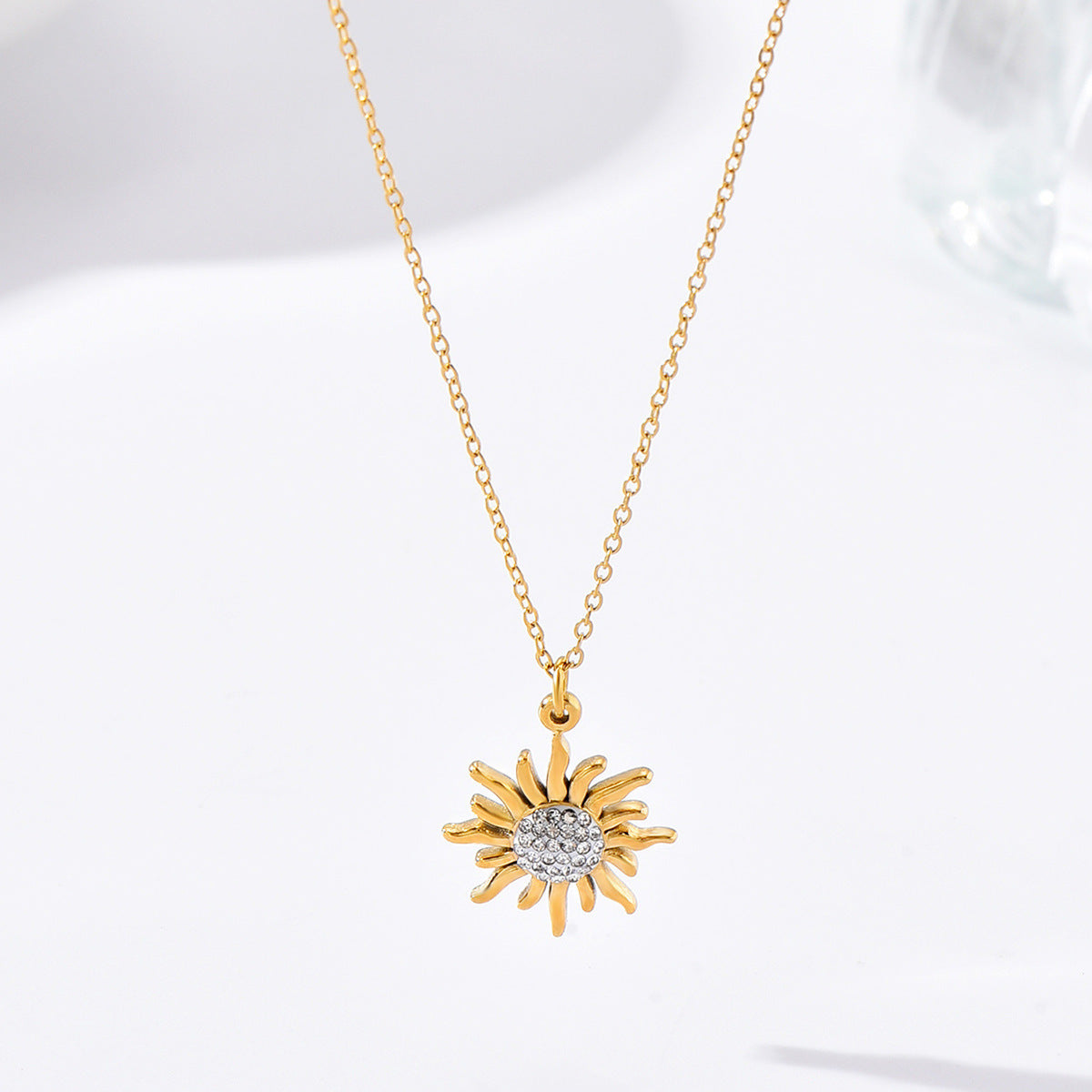 Pendentif tournesol acier doré 14K