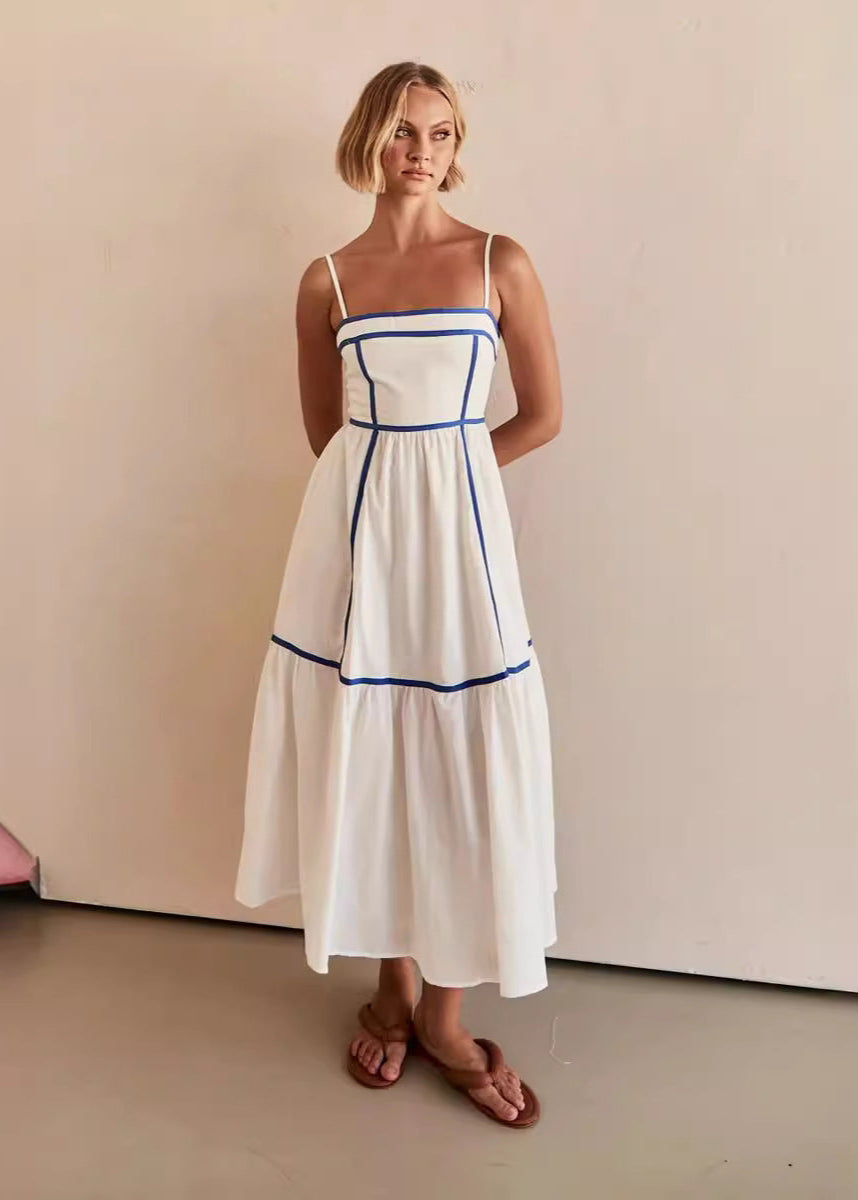 Robe mi-longue à bretelles fines et jupe volantée