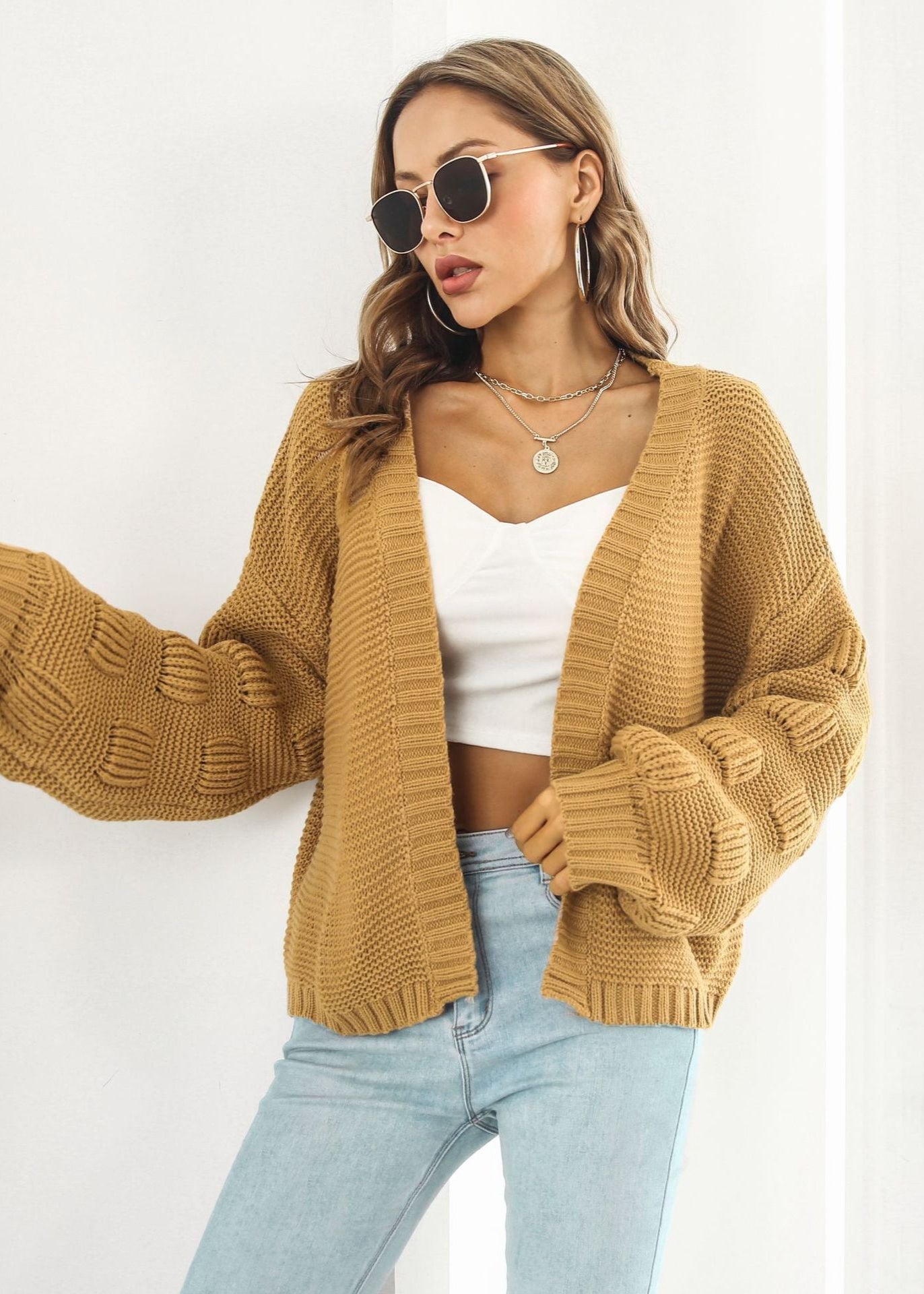 Cardigan en maille épaisse manches bouffantes