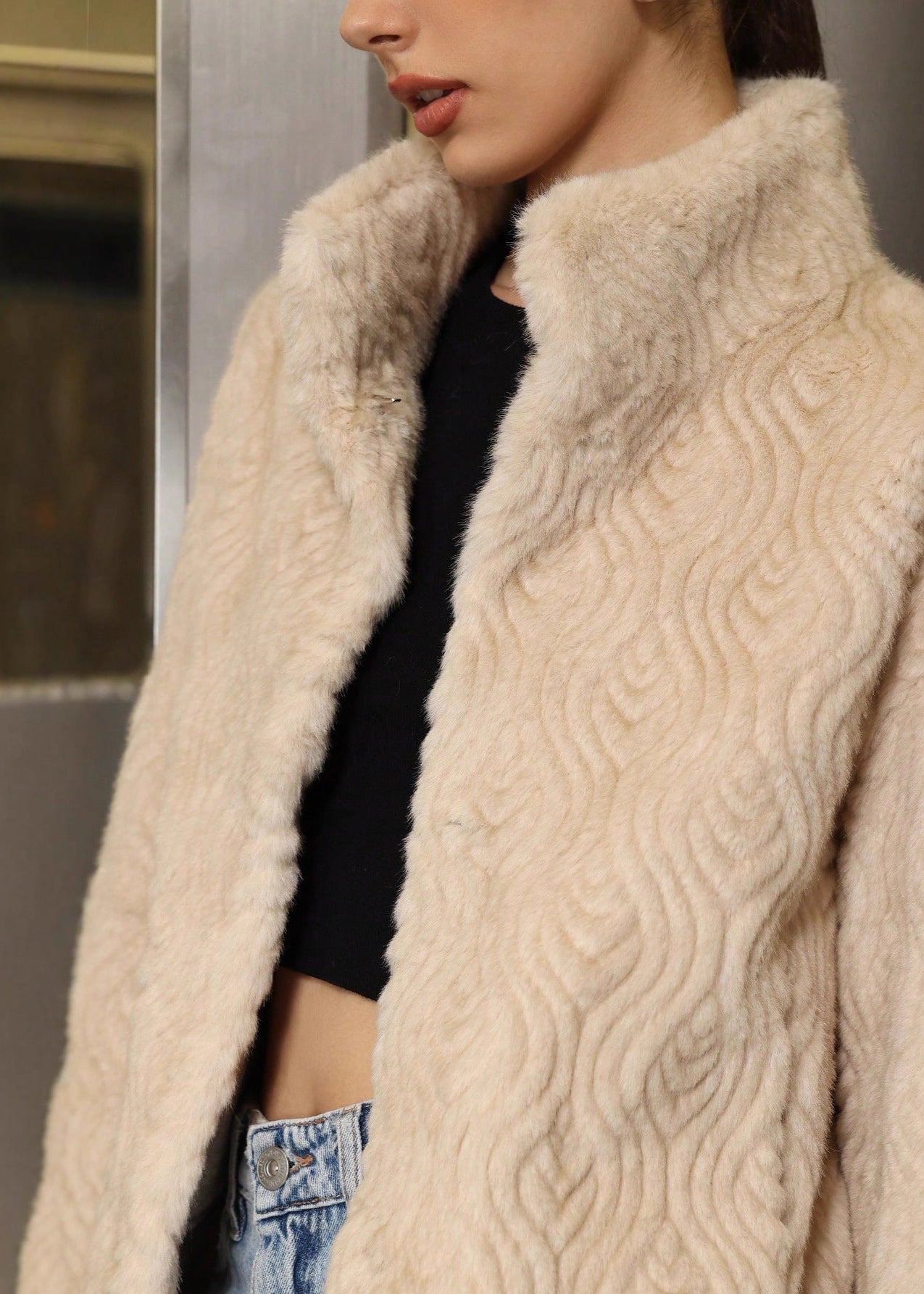 Manteau épais col montant femme