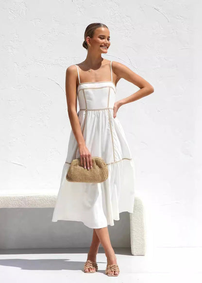 Robe mi-longue à bretelles fines et jupe volantée