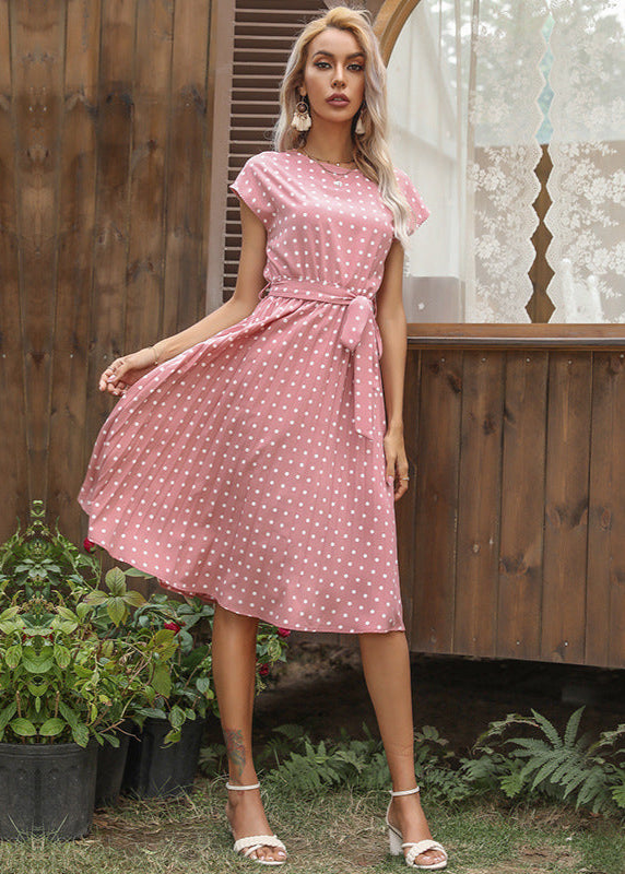 Robe midi à pois élégante ceinturée